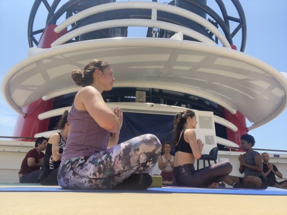 Disney cast doing yoga, Disney Cruise Line