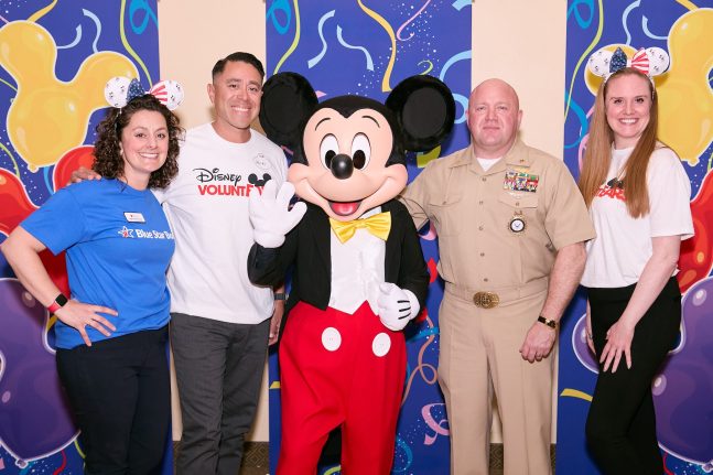 Blue Star Families, Jessica Moore, Mickey Mouse, and Disney Voluntears pictured