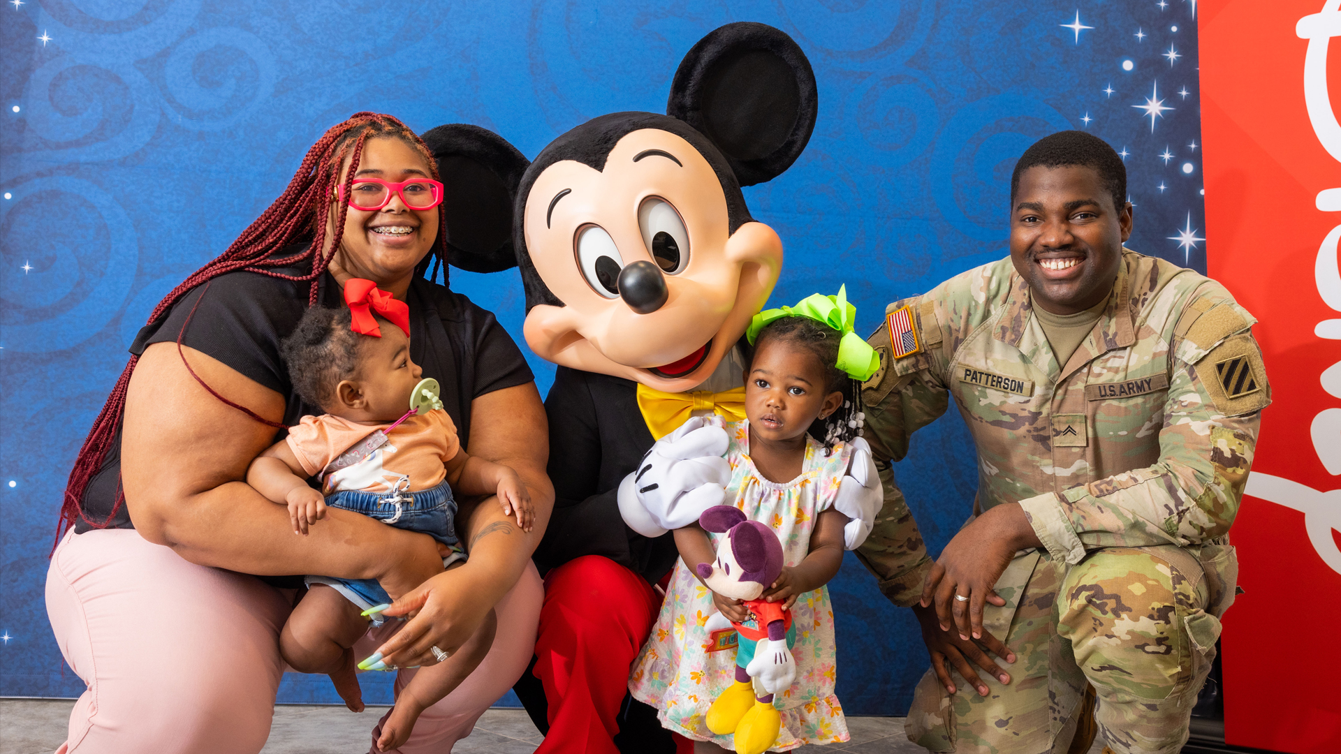 Fisher House - family pictured with Mickey Mouse