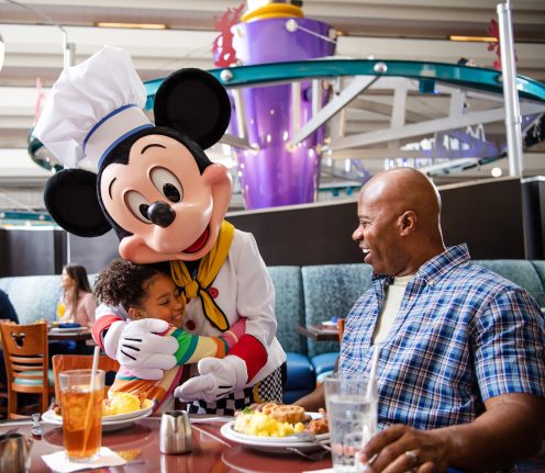 Mickey Mouse during a Character Dining experience at Walt Disney World Resort