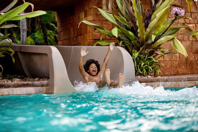 Child enjoys Walt Disney World Resort hotel pool