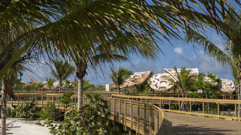 True-True Too BBQ surrounded by trees at Disney Lookout Cay at Lighthouse Point