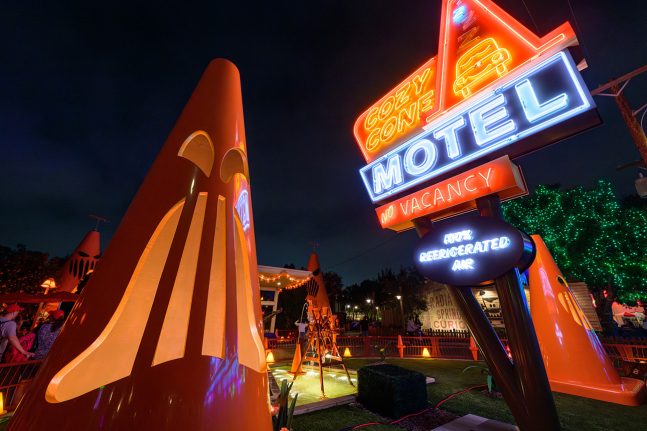 Cozy Cone Motel lit up at night