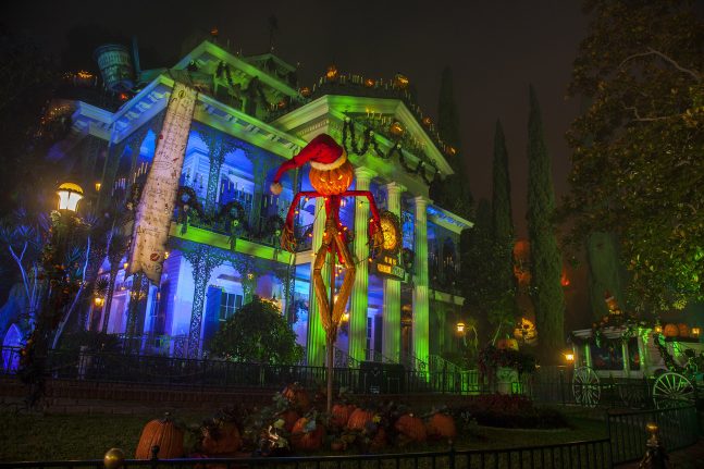 Exterior of Haunted Mansion Holiday at night