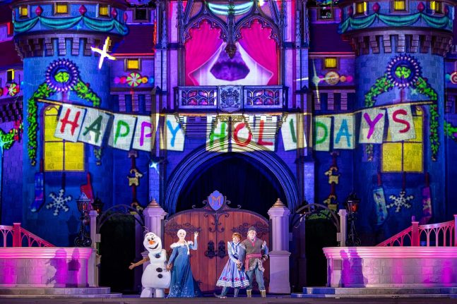 Frozen Holiday Surprise in front of Cinderella Castle