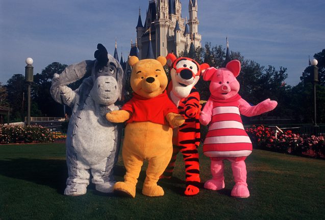 Eeyore, Pooh, Tigger and Piglet in front of Cinderella Castle at Magic Kingdom