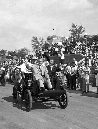 Walt Disney with California Governor Goodwin Knight, parading down Main Street, U.S.A.