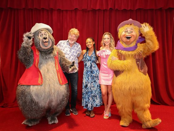 Emily Ann Roberts poses with Country Bears