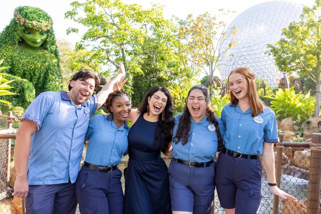 Cast members smile with Auli’i Cravalho at Journey of Water, Inspired by Moana
