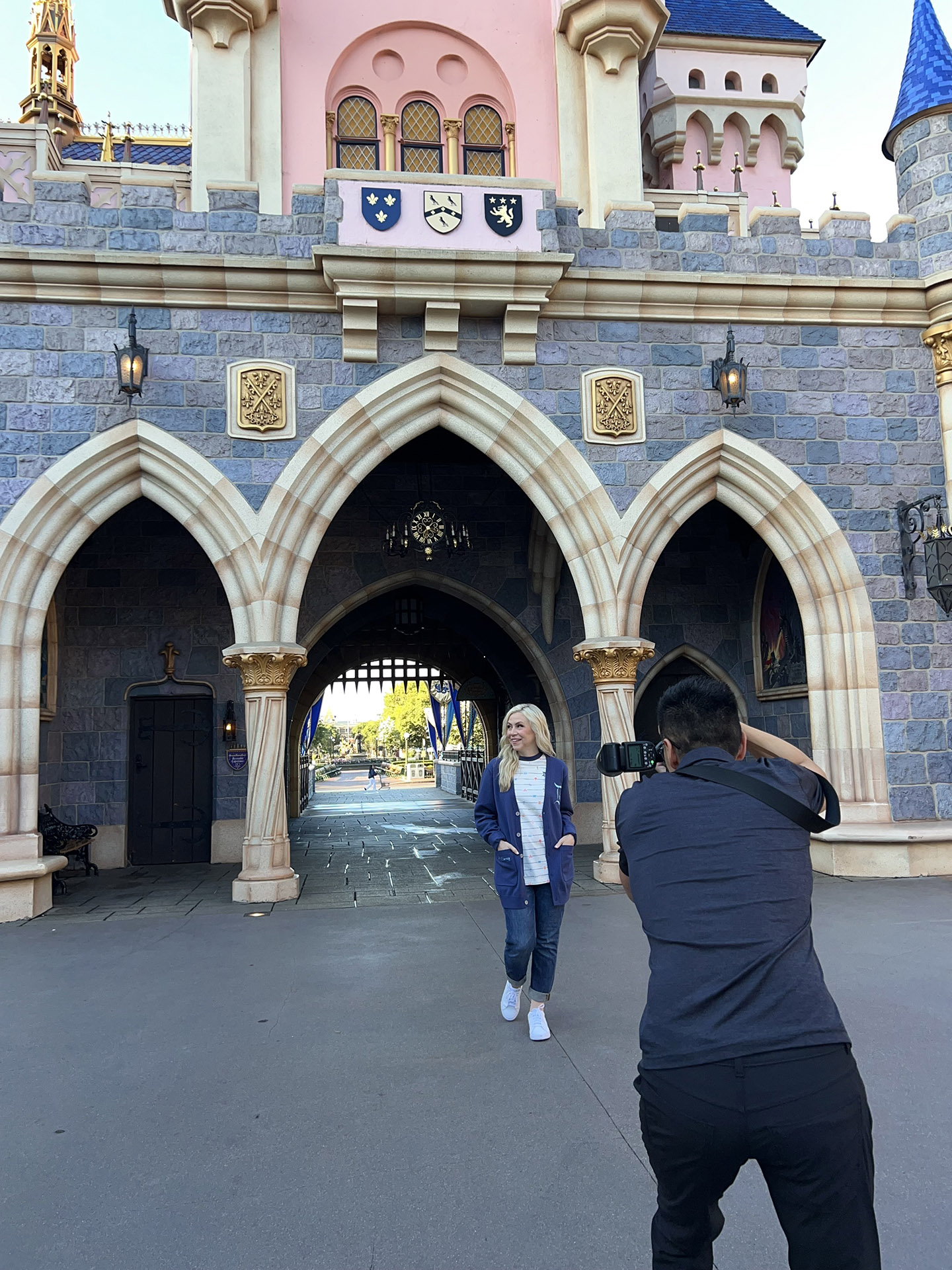 Ashley Eckstein gets her photo taken in front of Sleeping Beauty Castle