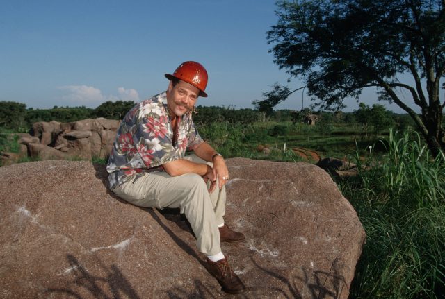 Joe Rohde smiles on a rock 