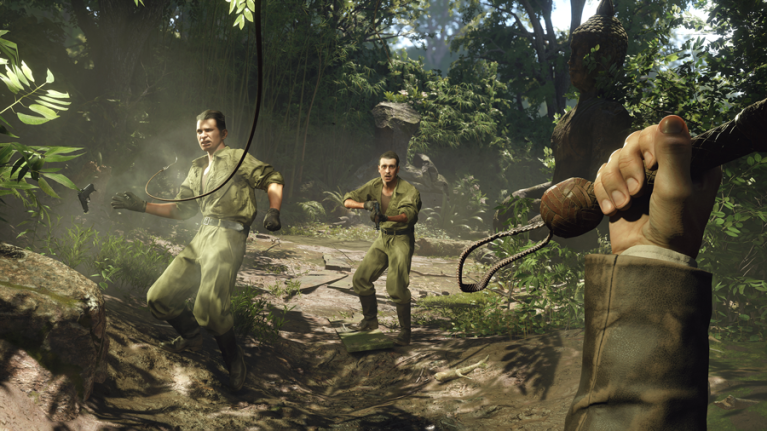 Screenshot of Indiana Jones using his whip against enemies in Indiana Jones and the Great Circle 