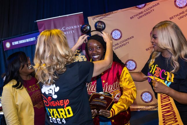 Beth Elia receives her scholarship at the HBCU Week Foundation College Fair