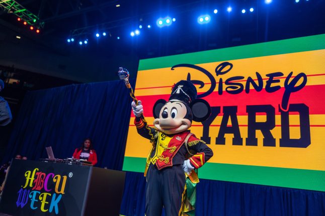 Drum Major Mickey Mouse performs on stage