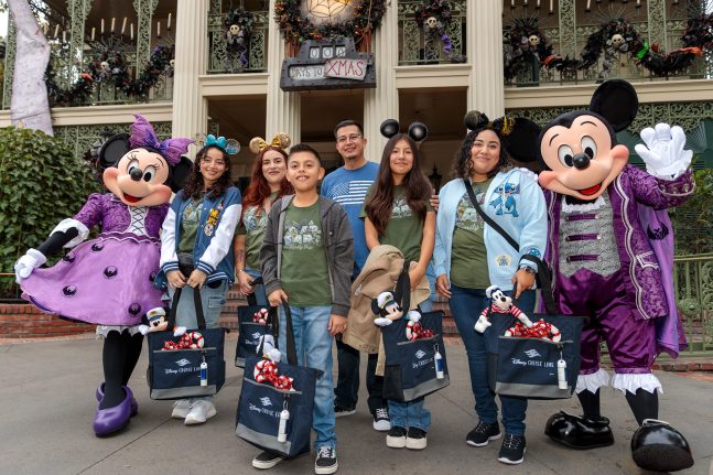 David and his family are surprised by Mickey Mouse and Minnie Mouse with a sailing on the Disney Treasure