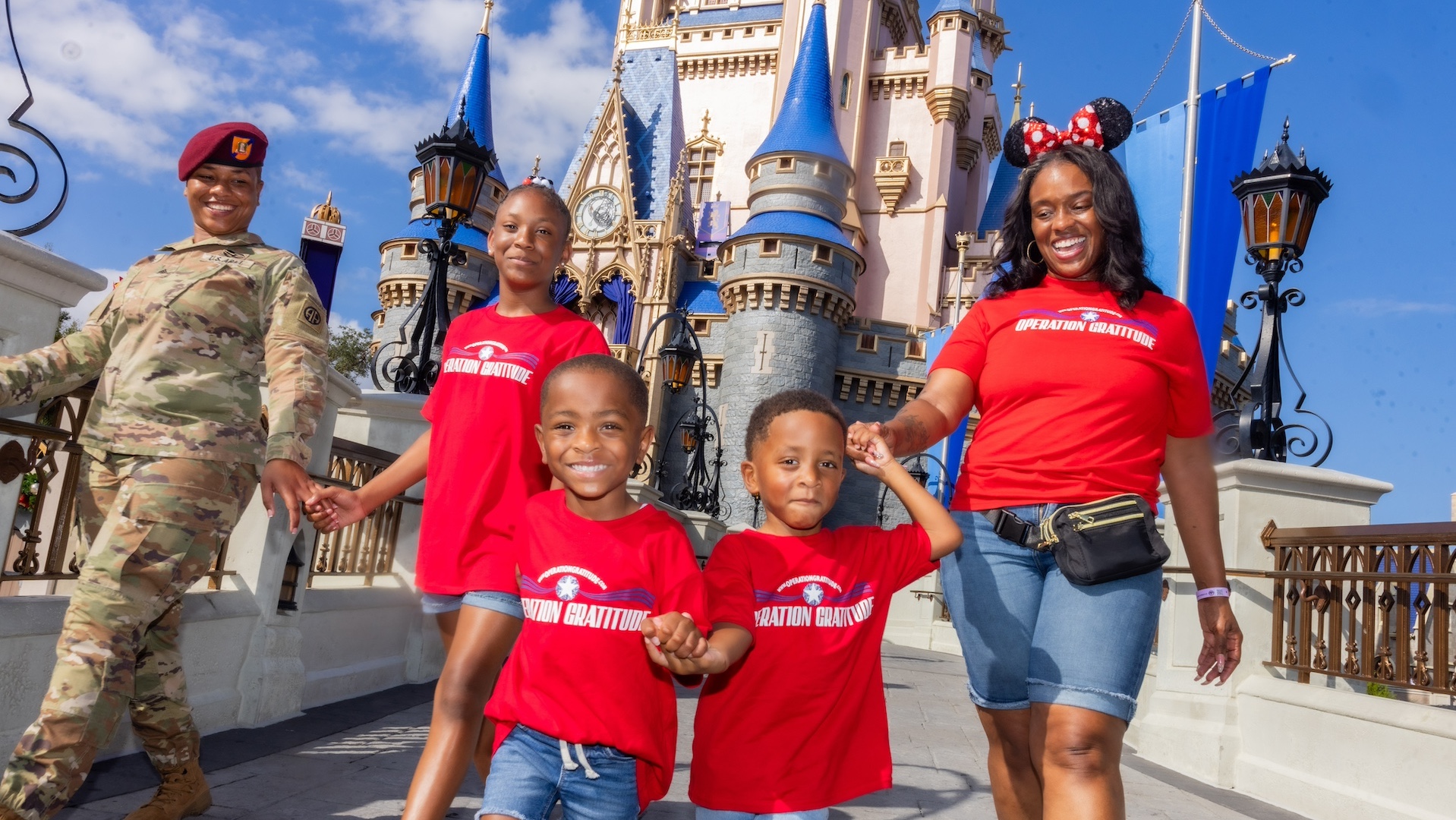 Sgt. Harris, her mother Jacquline and her children enjoying their day at Magic Kingdom Park in Walt Disney World Resort. (Photo Credit: Disney Parks)