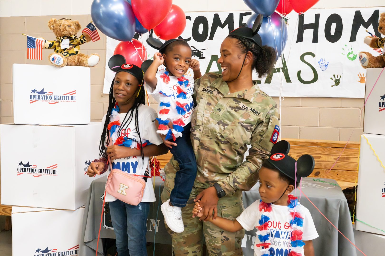 Sgt. Harris and her three children celebrating her homecoming at Fort Liberty, North Carolina June 23, 2024, following her 6-month deployment to Southwest Asia. (Photo Credit: Operation Gratitude)