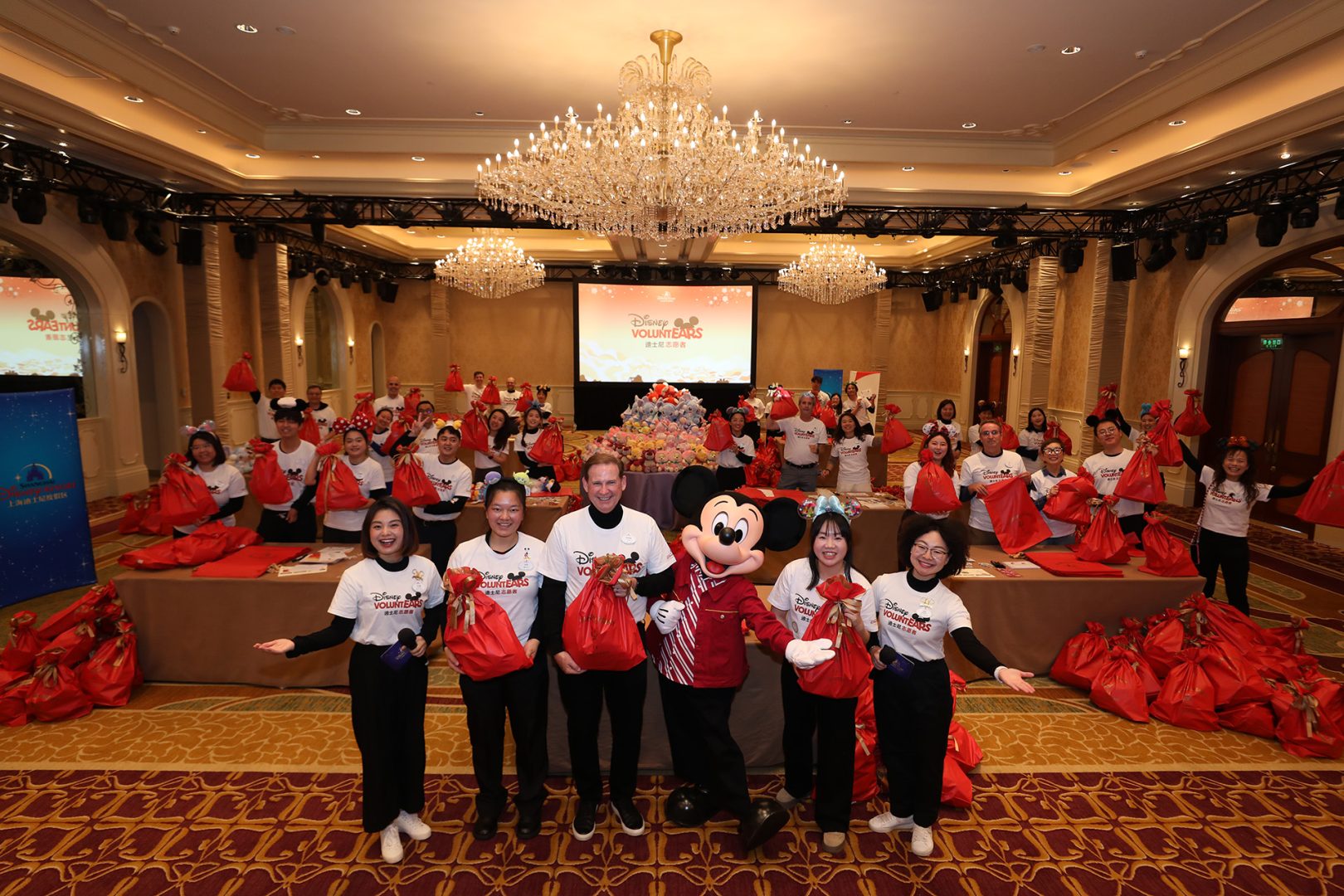 Mickey Helps Wrap Gifts for Chinese New Year in Shanghai  