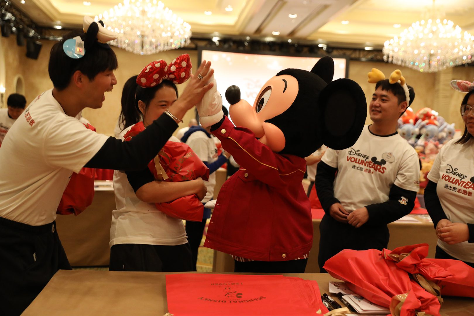 Mickey Helps Wrap Gifts for Chinese New Year in Shanghai  