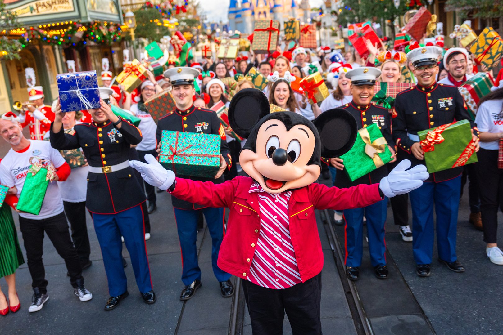 Mickey Mouse with cast members and local Marines on Main Street, U.S.A. in Magic Kingdom