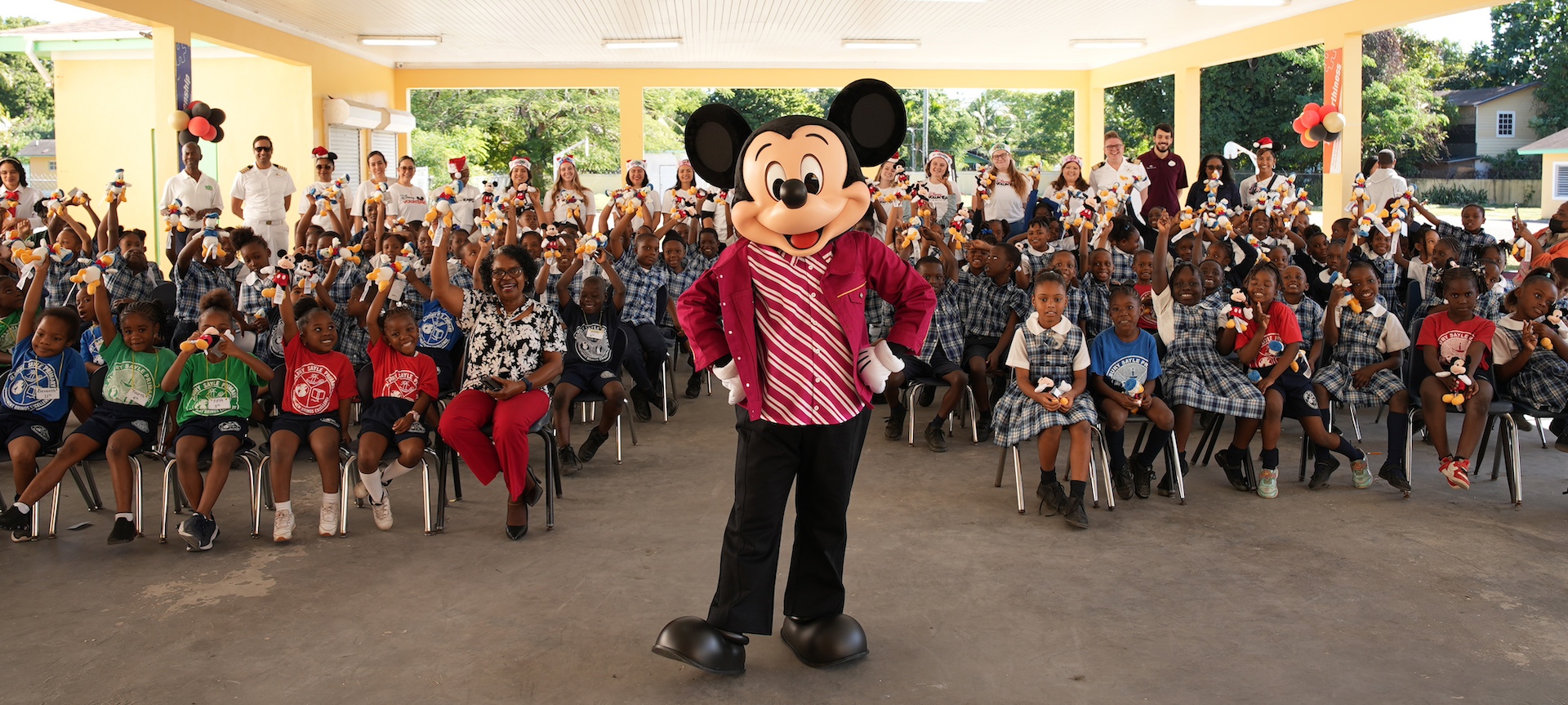 Mickey Visits the Bahamas to Bring Toys to a School in Nassau  