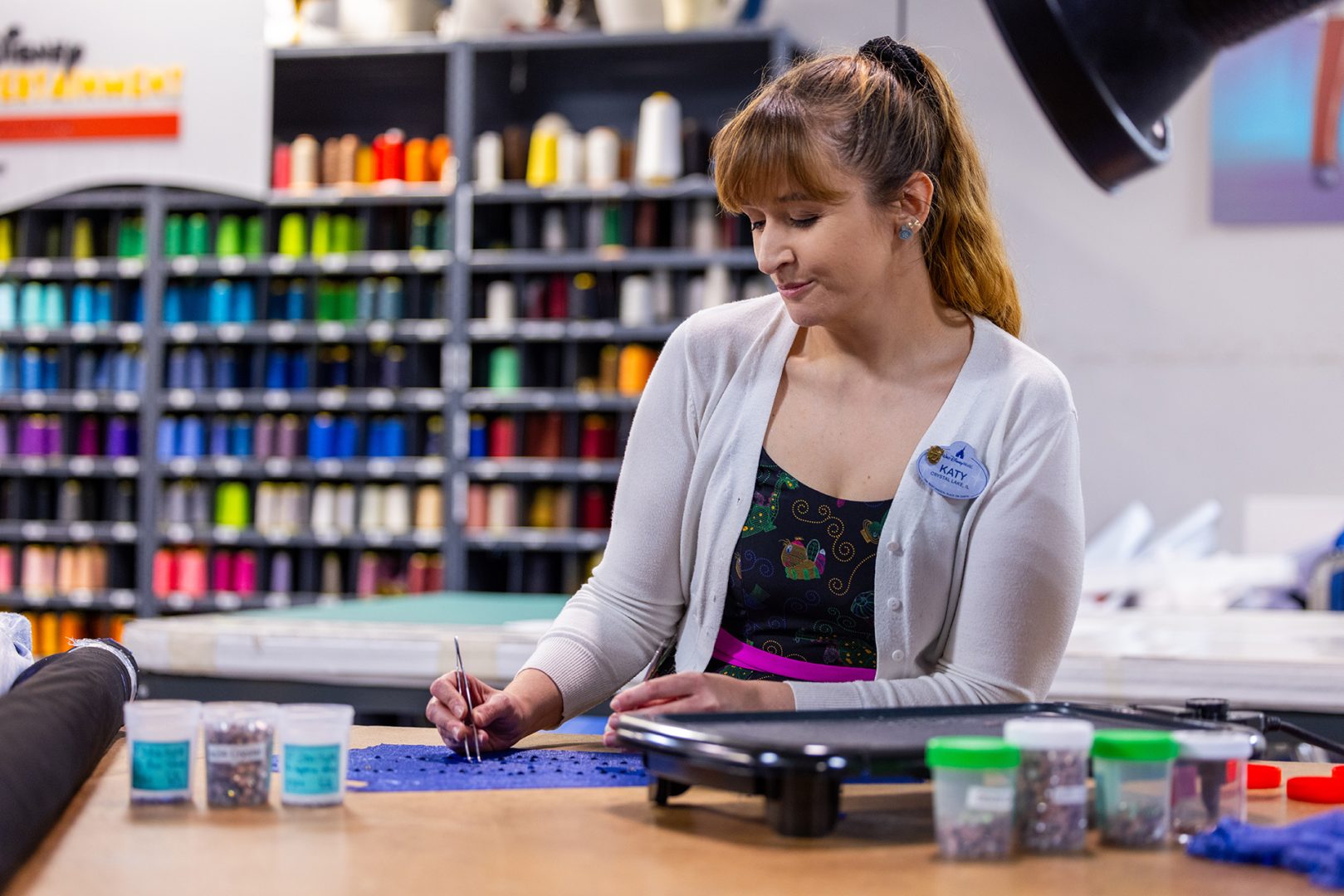 Cast working on embroidery for “Disney Starlight: Dream the Night Away”