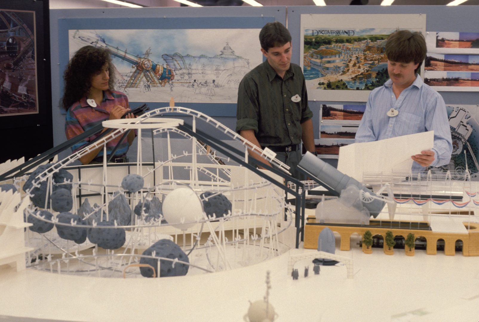 Imagineers work on a model of Space Mountain for Disneyland Paris