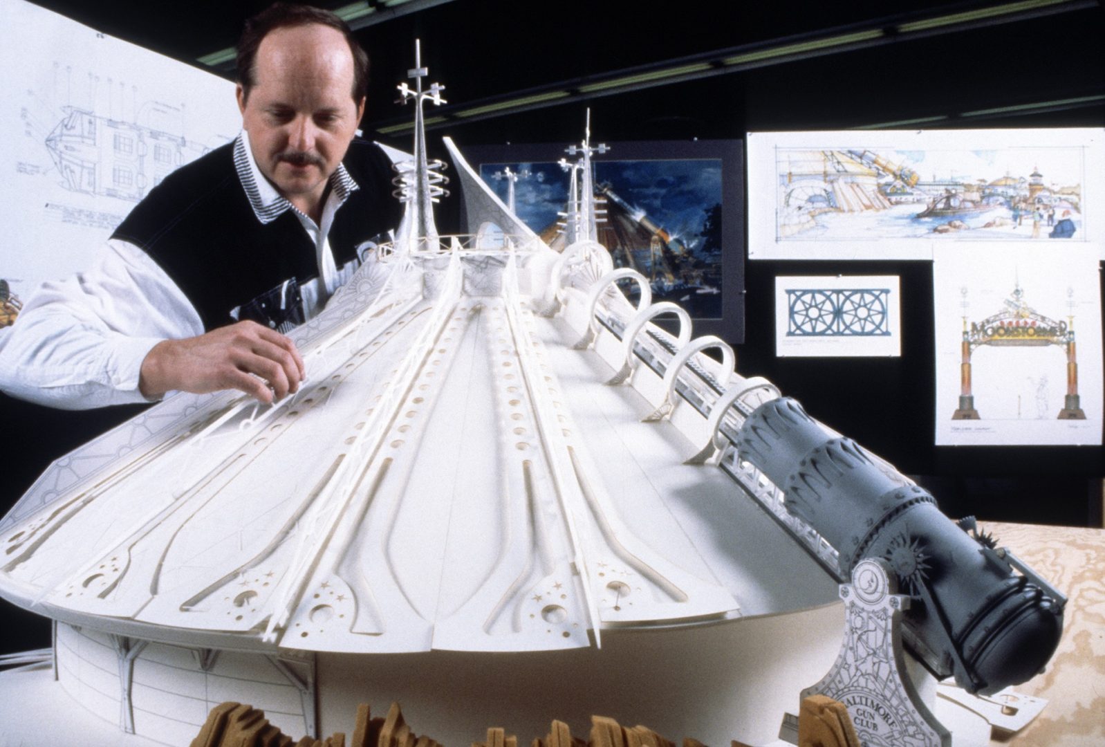 Imagineers work on a model of Space Mountain for Disneyland Paris