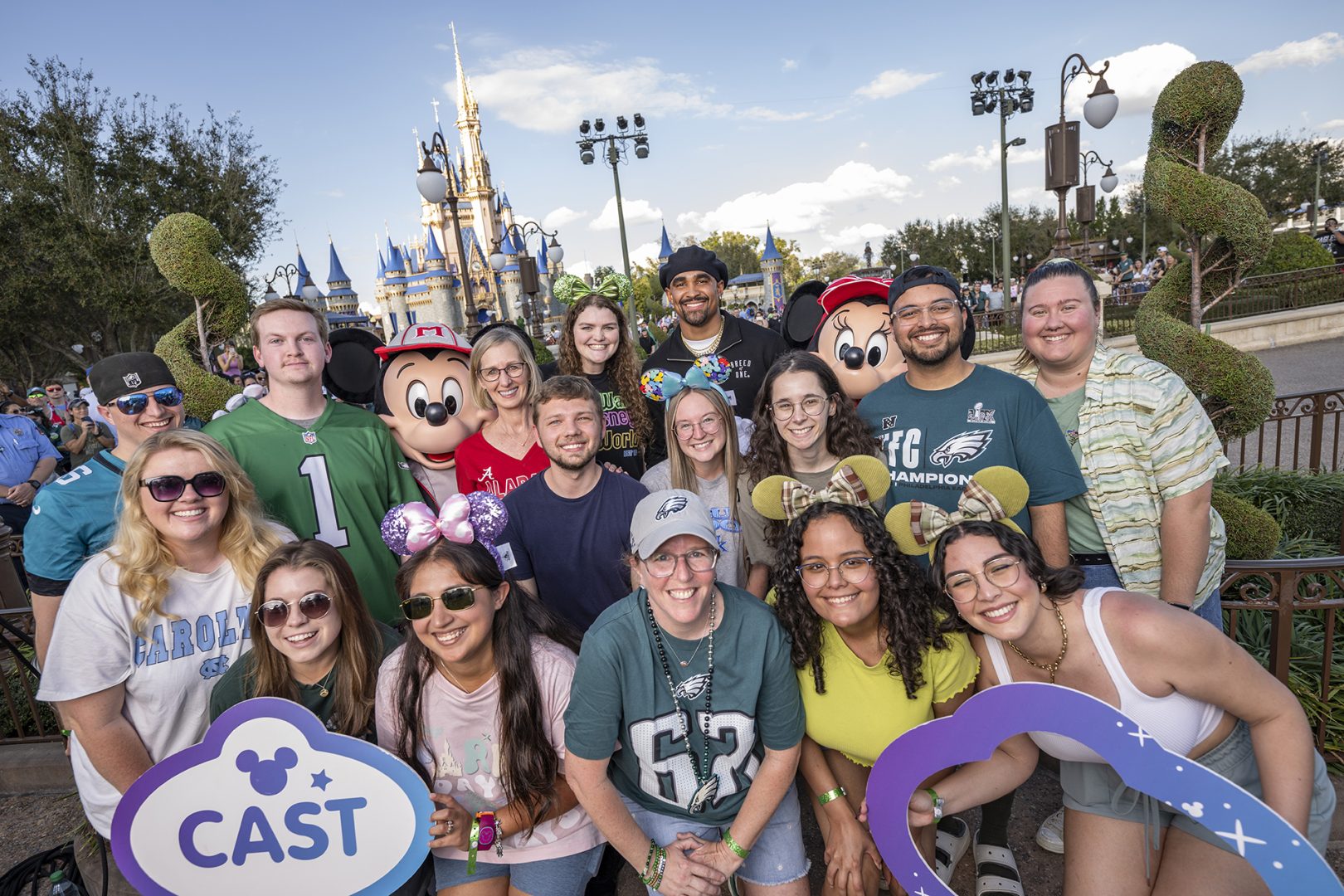 Walt Disney World cast members with Super Bowl MVP Jalen Hurts at Magic Kingdom