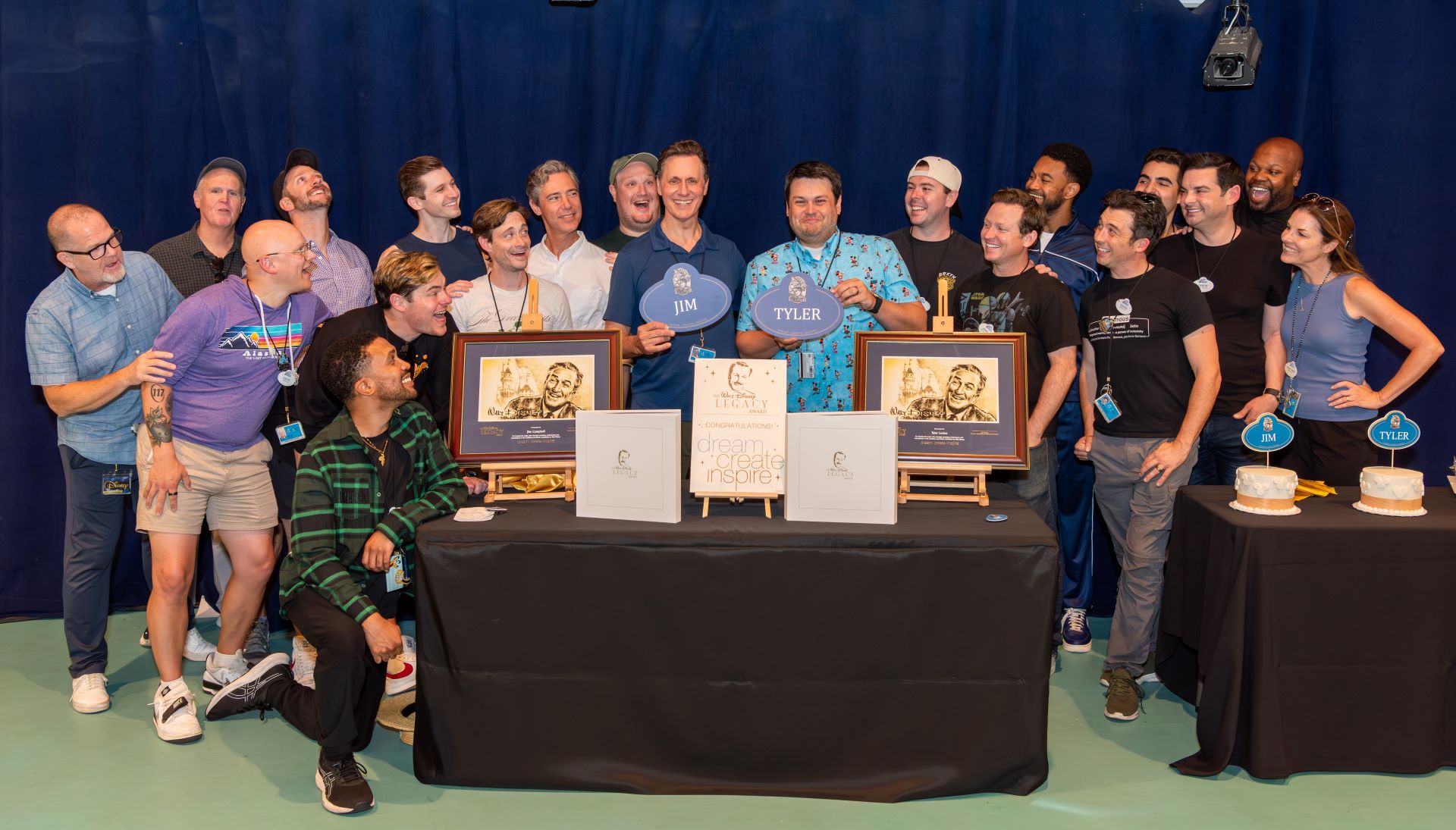 Group of people celebrating Legacy Award recipients at Disneyland Resort.