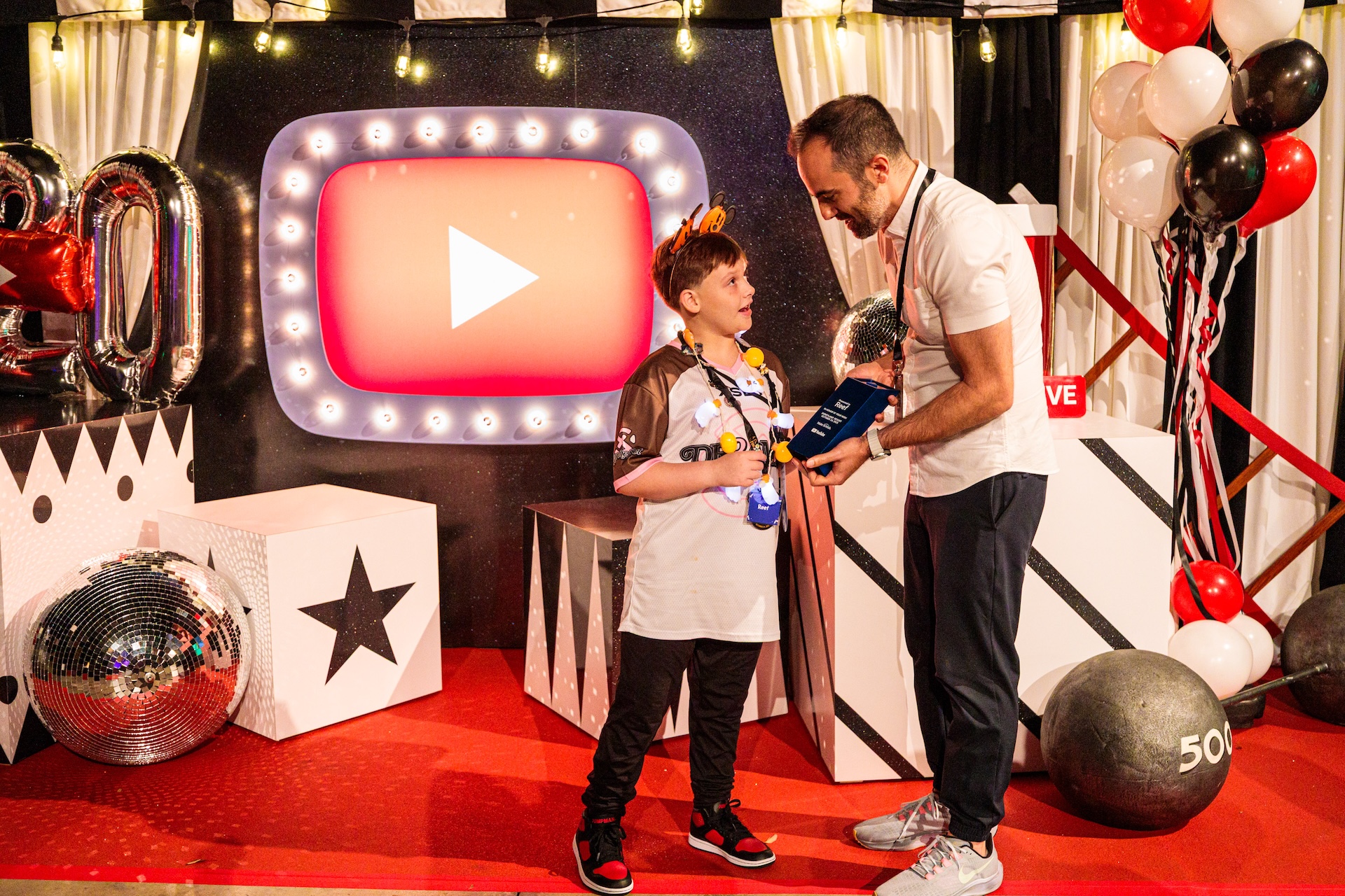Make-A-Wish family at YouTube area at A Frightfully Fun Wish