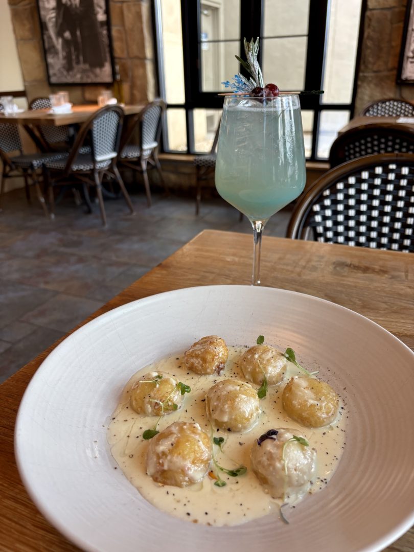 4 Cheese Truffle Gnocchi: Large handmade potato gnocchi served in a cream sauce featuring Grana Padano, Gorgonzola, mascarpone, and fontina cheese finished with truffle oil (New)
