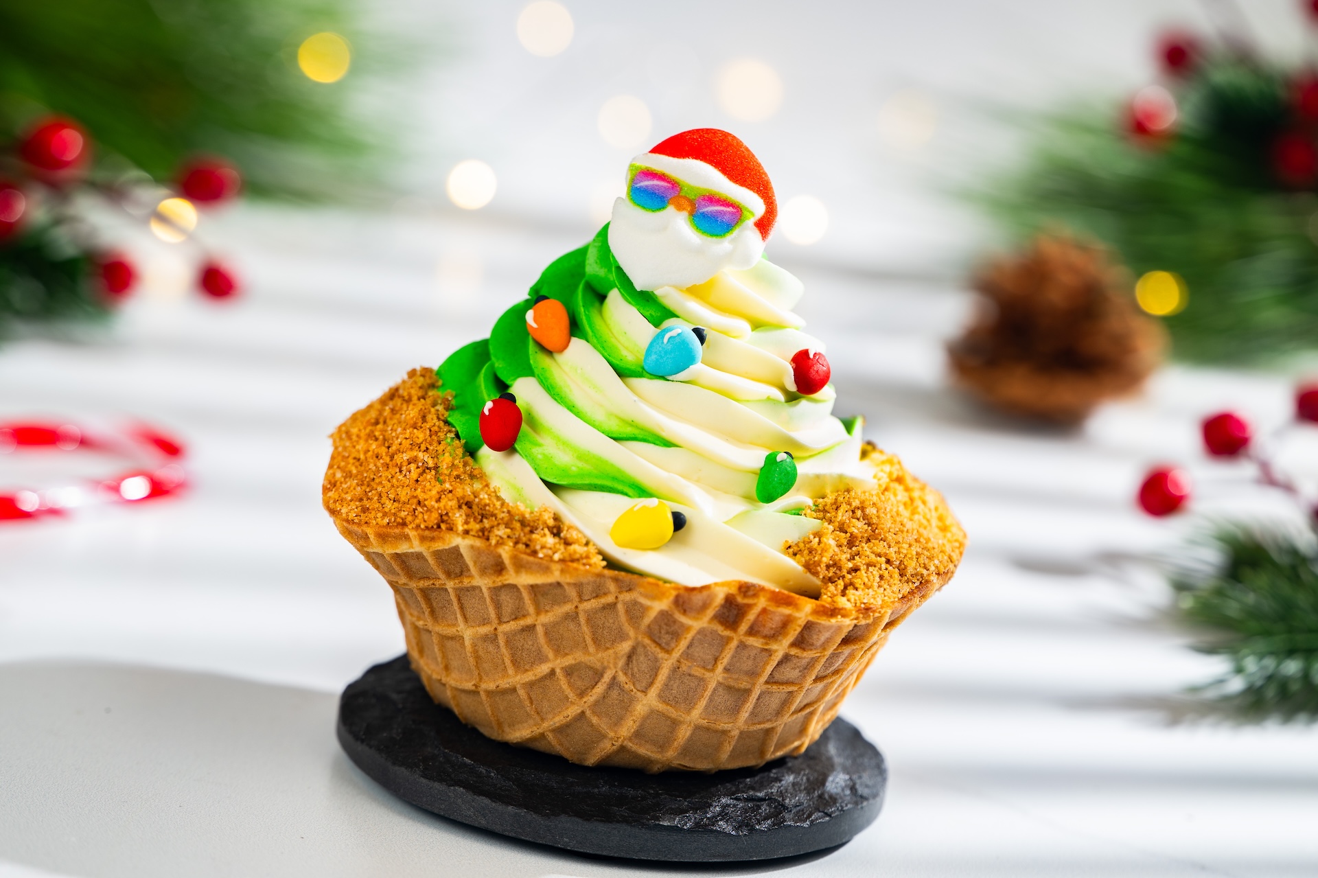 Tropical Holiday Tree Sundae: Waffle bowl with DOLE Whip Lime, coconut soft-serve, sugar tree lights, graham cracker crumbs, and sugar piece (New) 