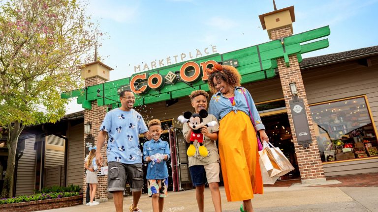Family of four enjoying a day at Disney Springs