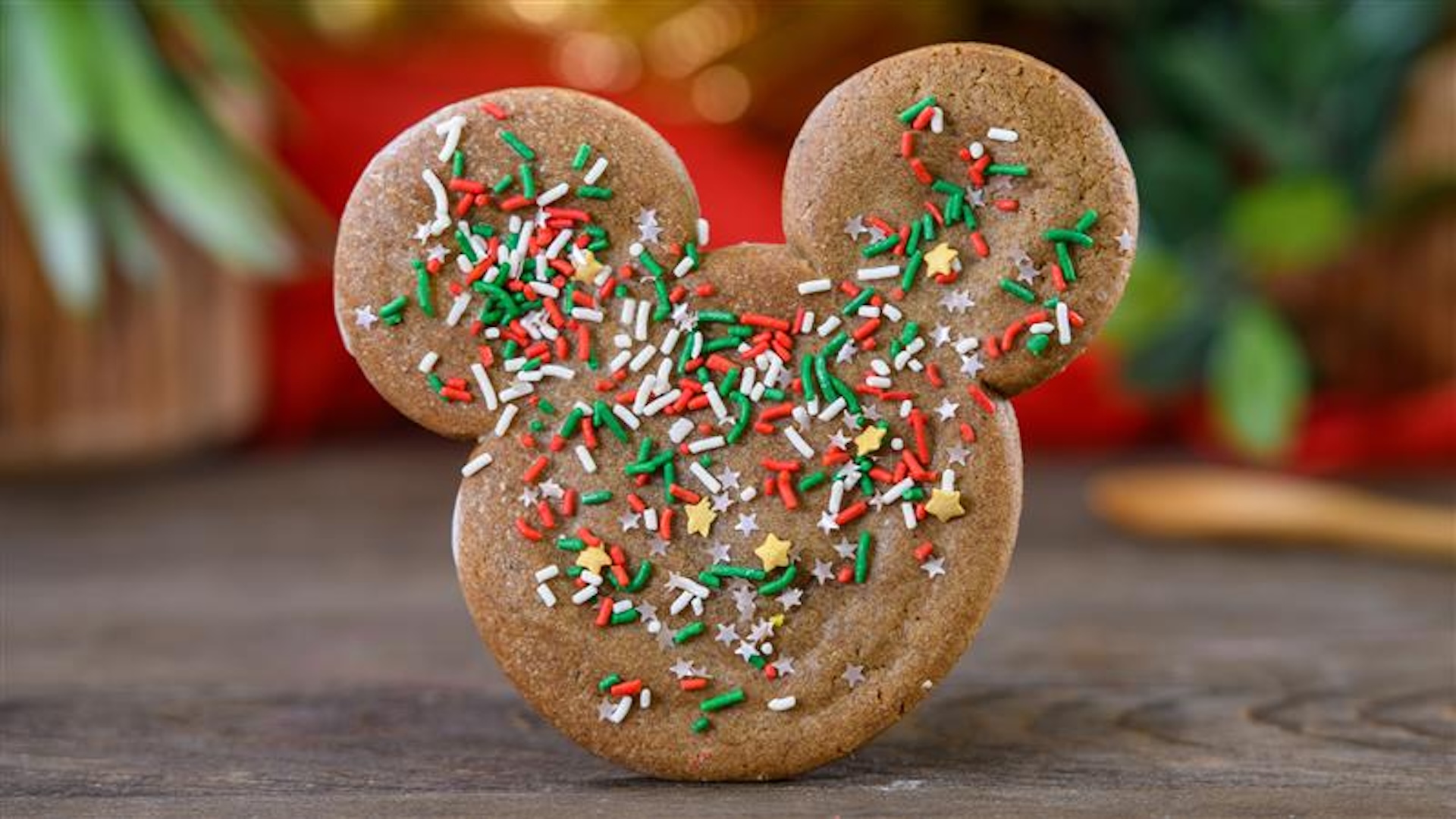 Mickey-shaped Gingerbread Cookie: Soft gingerbread Mickey cookie with sprinkles 