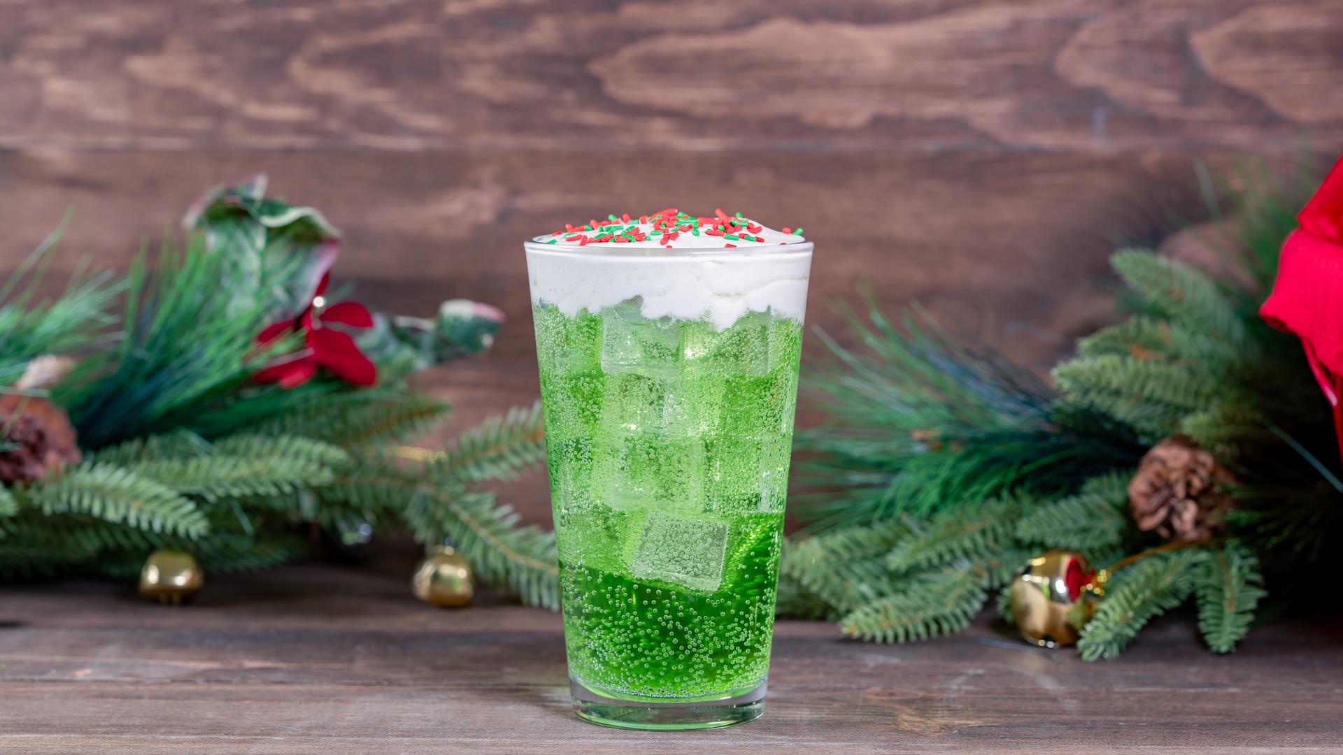 Holiday Green Drink: Apple-flavored beverage topped with caramel cold foam and sprinkles (Non-alcoholic) 