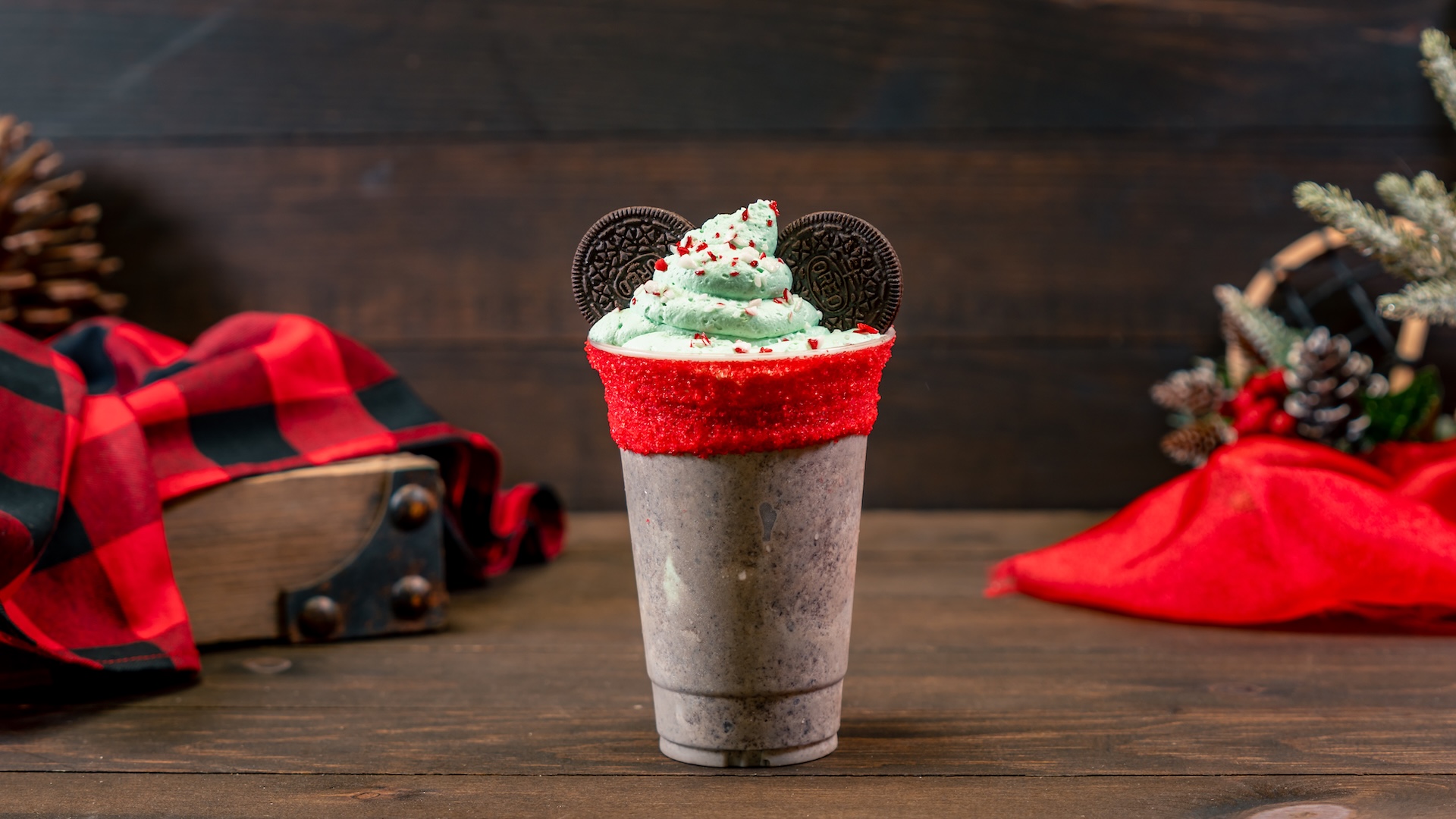 Elf Mickey Shake: mint and chocolate cookie shake garnished with green whipped cream and crushed peppermint candy (Non-alcoholic) 