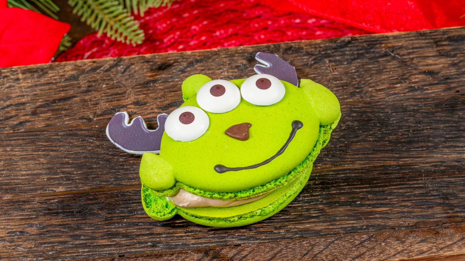 Alien Reindeer Macarooooon filled with salted caramel buttercream, chocolate ganache, and brownie pieces 