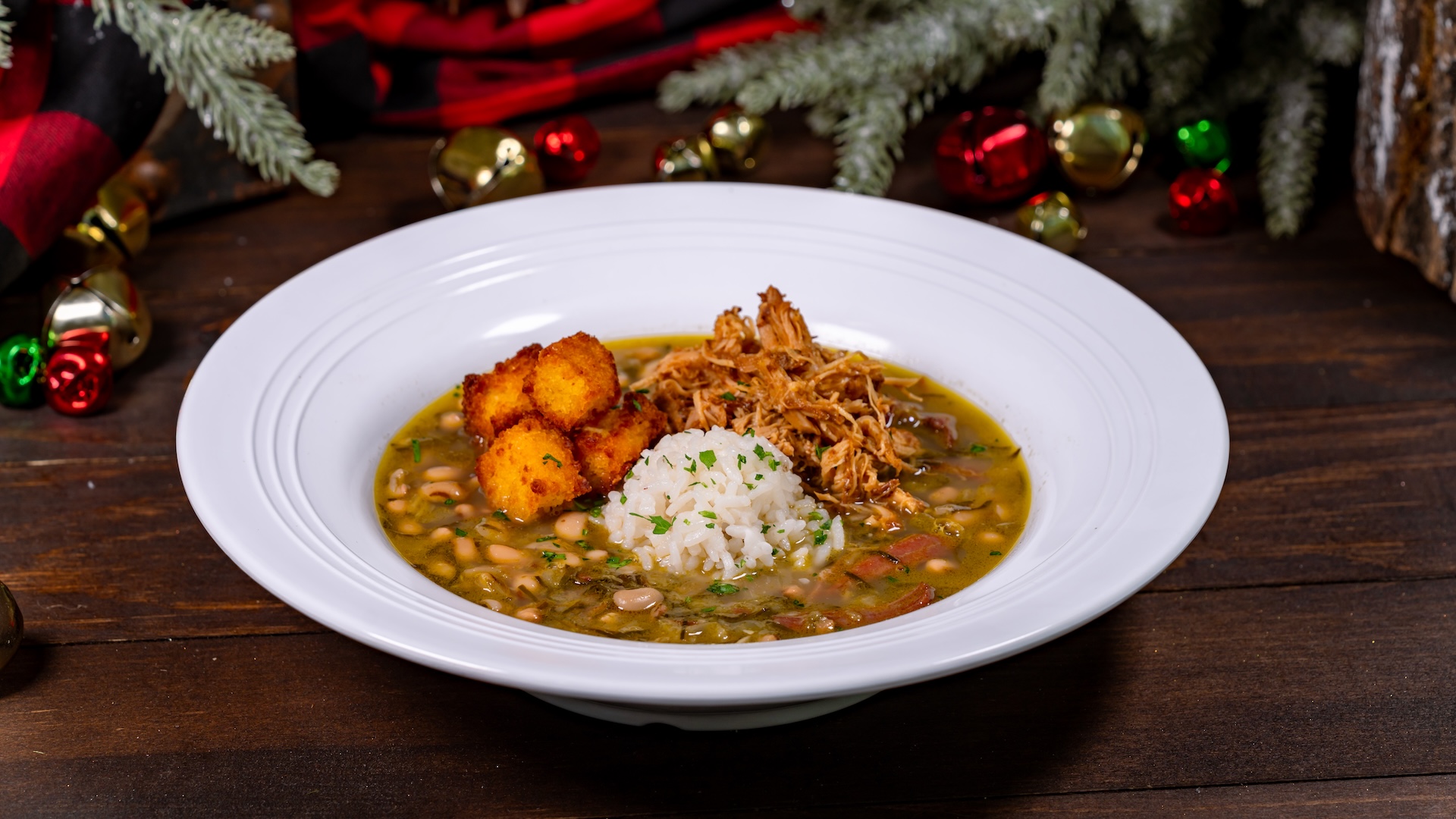 Black Eyed Pea Stew with Chicken and Corn Bread Croutons: Slow-simmered black-eyed peas with smoked turkey, braised chicken, bell peppers, celery, and onions served with heritage rice and cornbread croutons (New) 