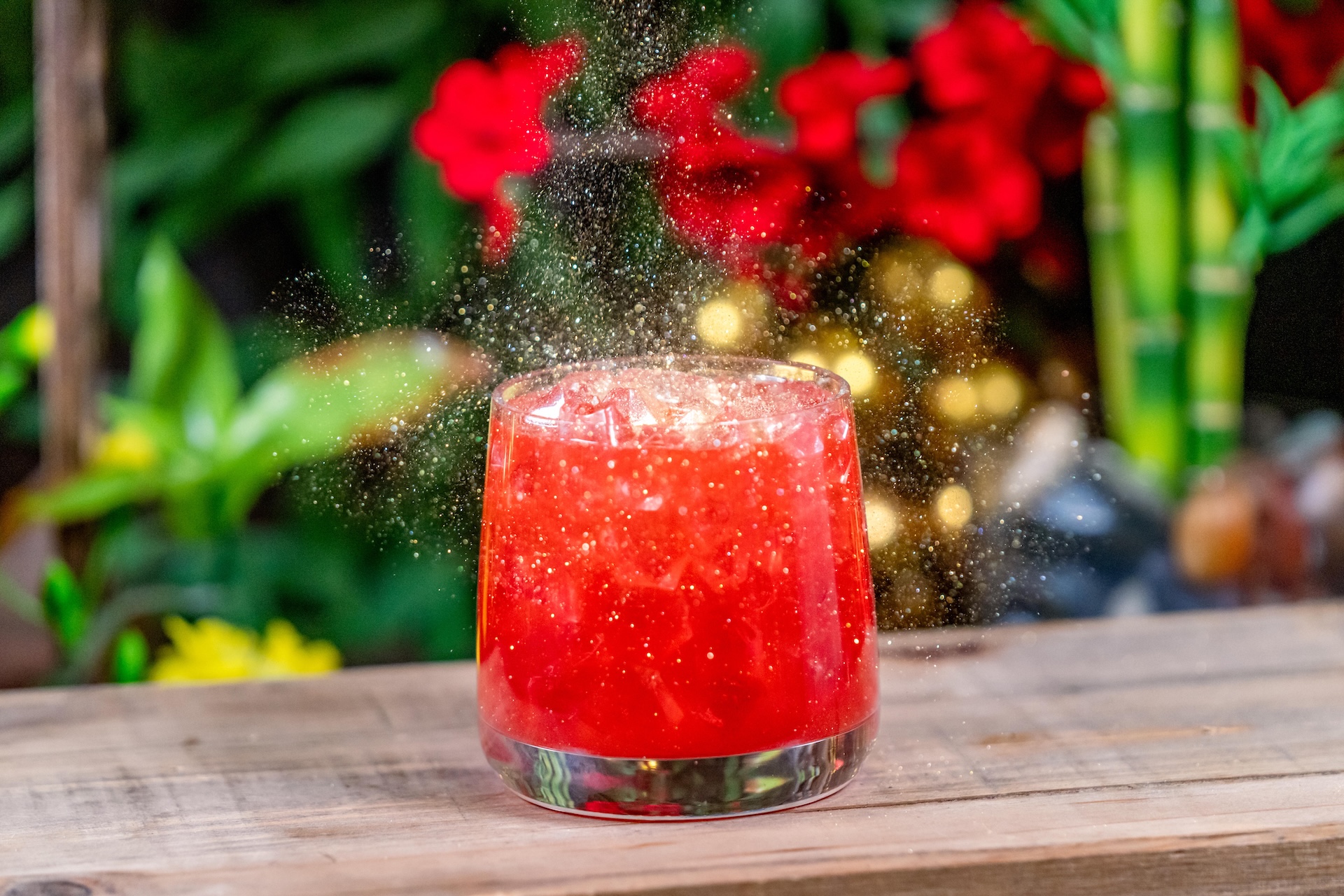 Red Envelope Margarita: Tequila, orange juice, sweet and sour, raspberry pur&eacute;e, blood orange syrup, and gold shimmer (New)