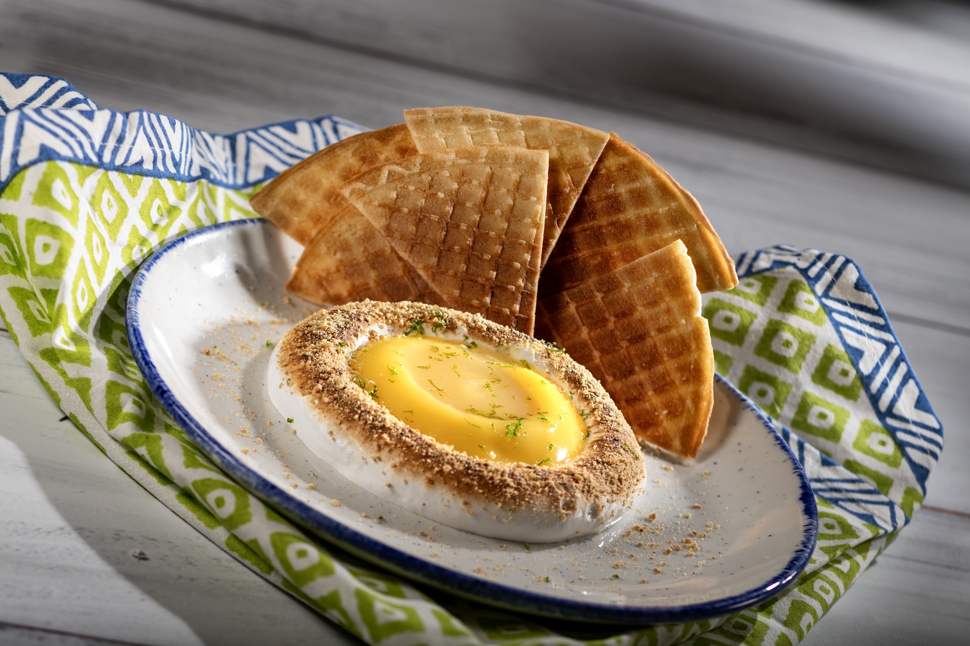 Deconstructed Key Lime Pie: Key lime curd, key lime gel&eacute;e, toasted meringue, and graham cracker crumbs with waffle cone triangles (New)