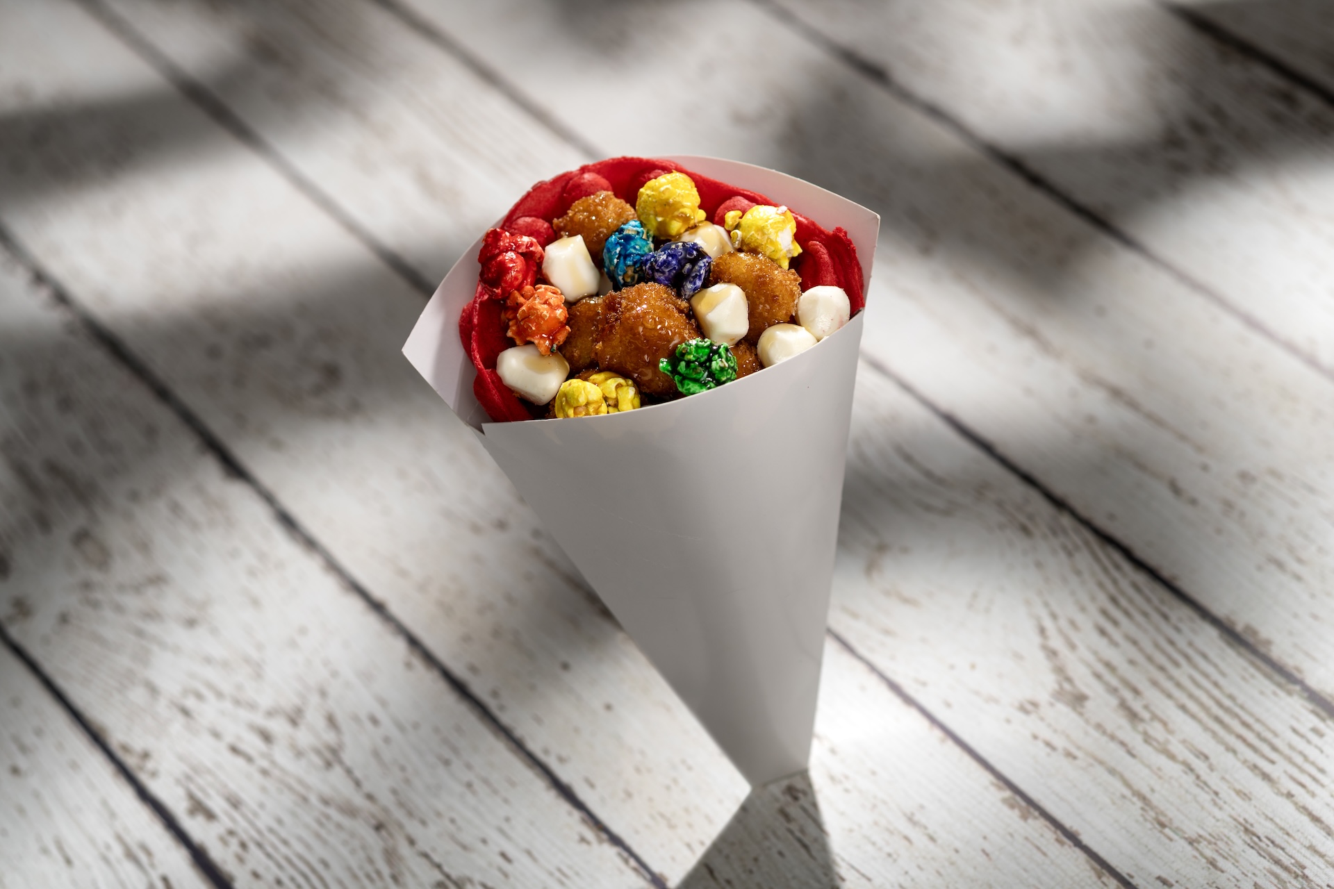 Popcorn, Popcorn Chicken and Waffles with rainbow popcorn, popcorn chicken, mini mozzarella, and maple syrup (New)