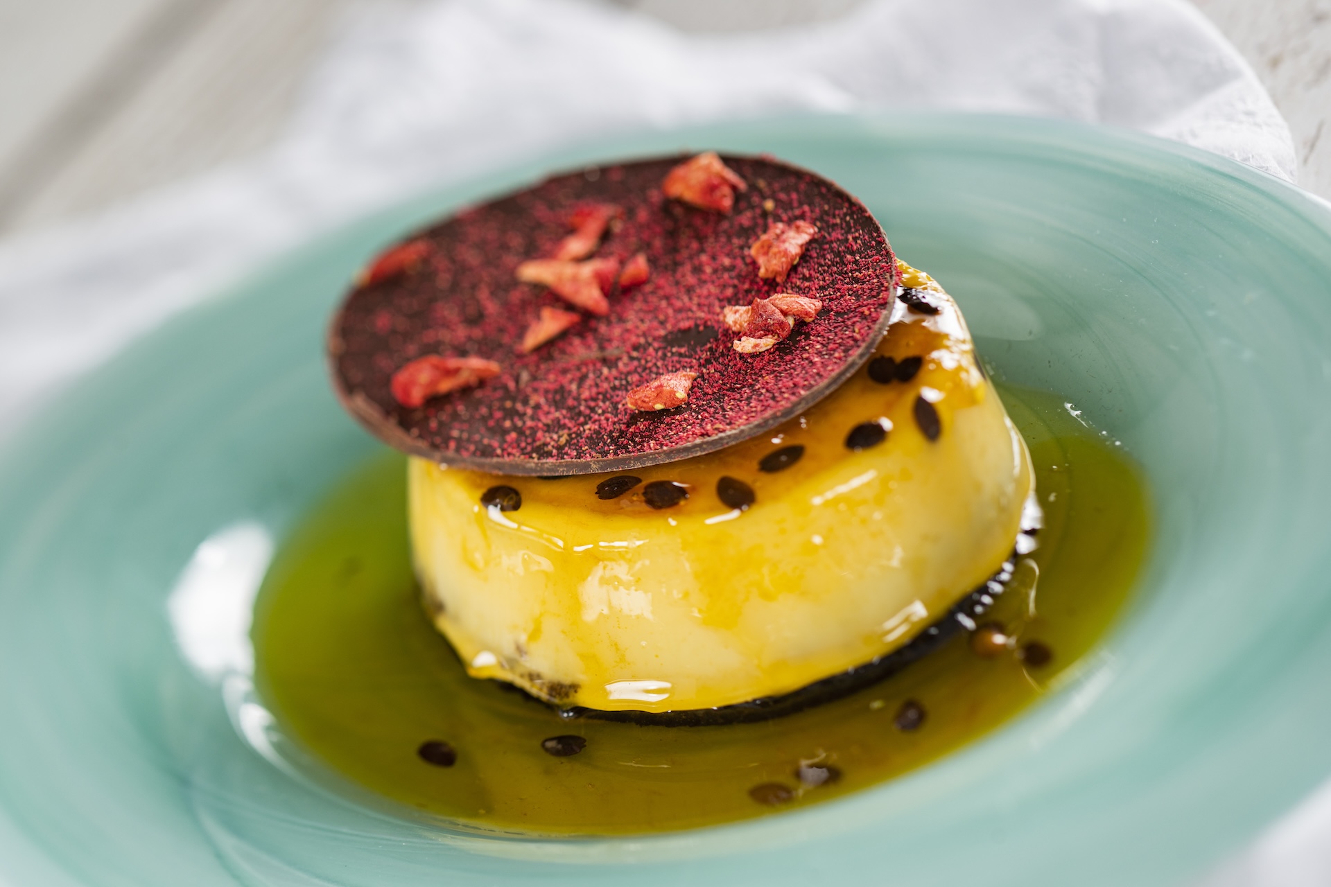 Coconut-Chocolate Flan Bizcocho: Chocolate cake, coconut custard, and passion fruit caramel (Plant-based)