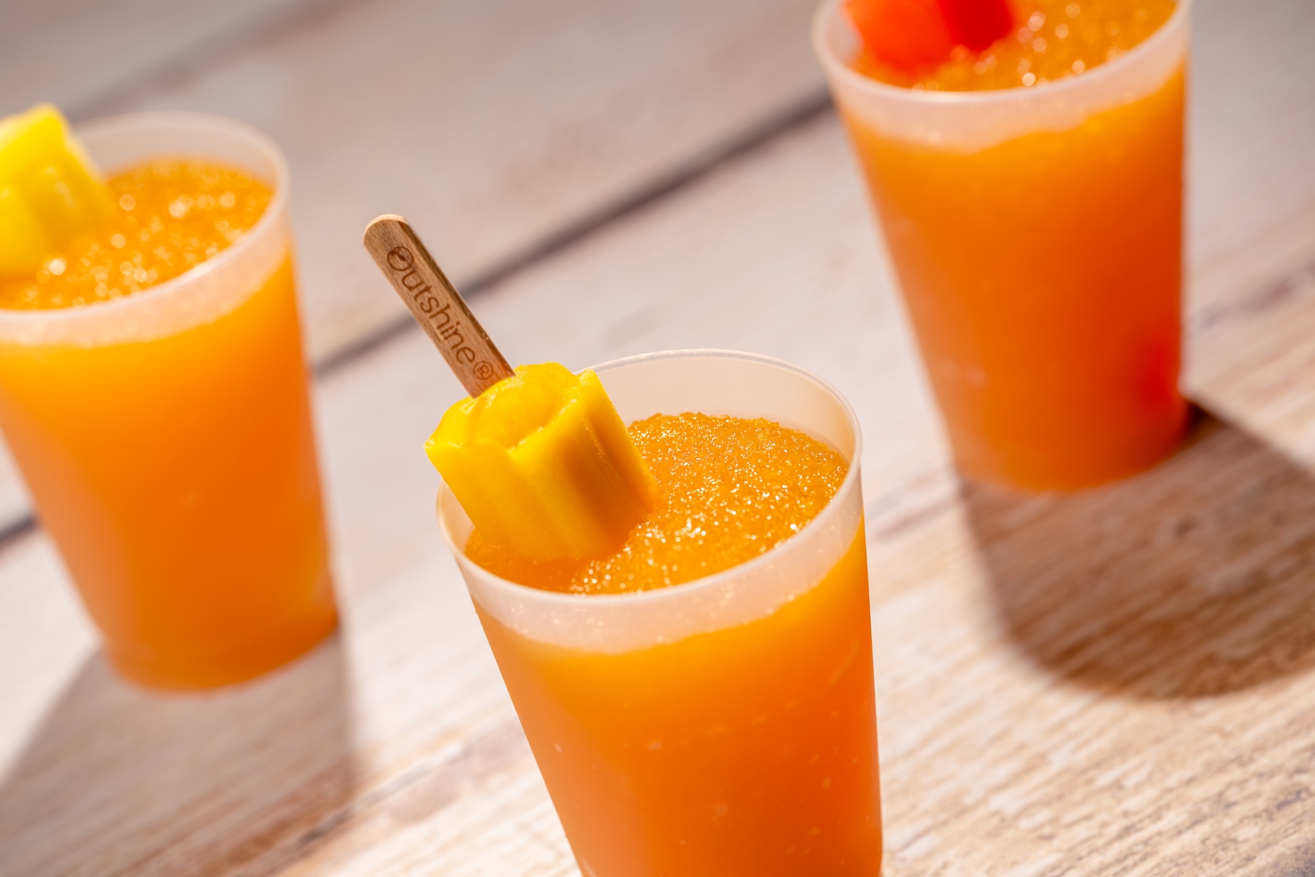 Frozen Island Escape: Minute Maid Peach and Mango Smoothie featuring an Outshine Frozen Mini Fruit Pop (Non-alcoholic) (New)