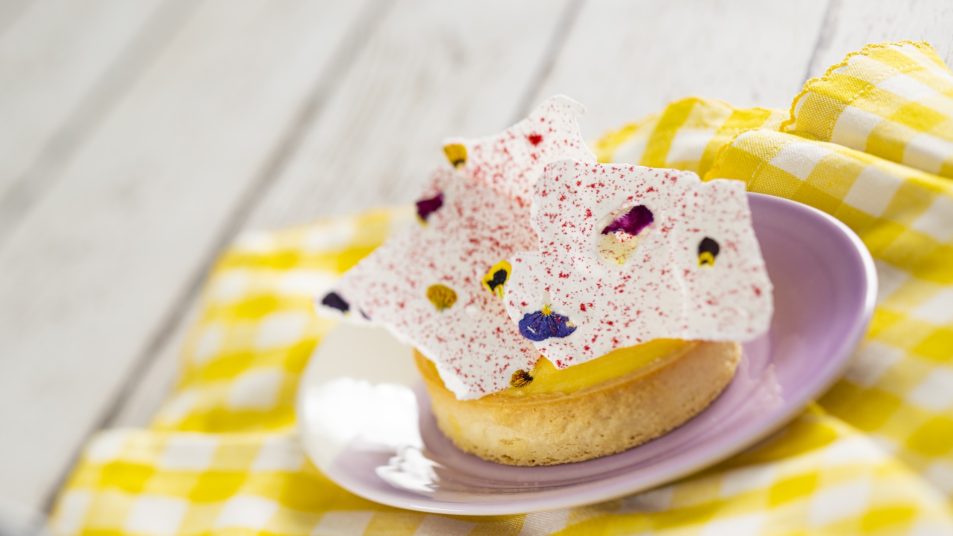 Lemon Tart with lemon curd, blood orange fluid gel, plant-based meringue, and raspberry powder (Plant-based)