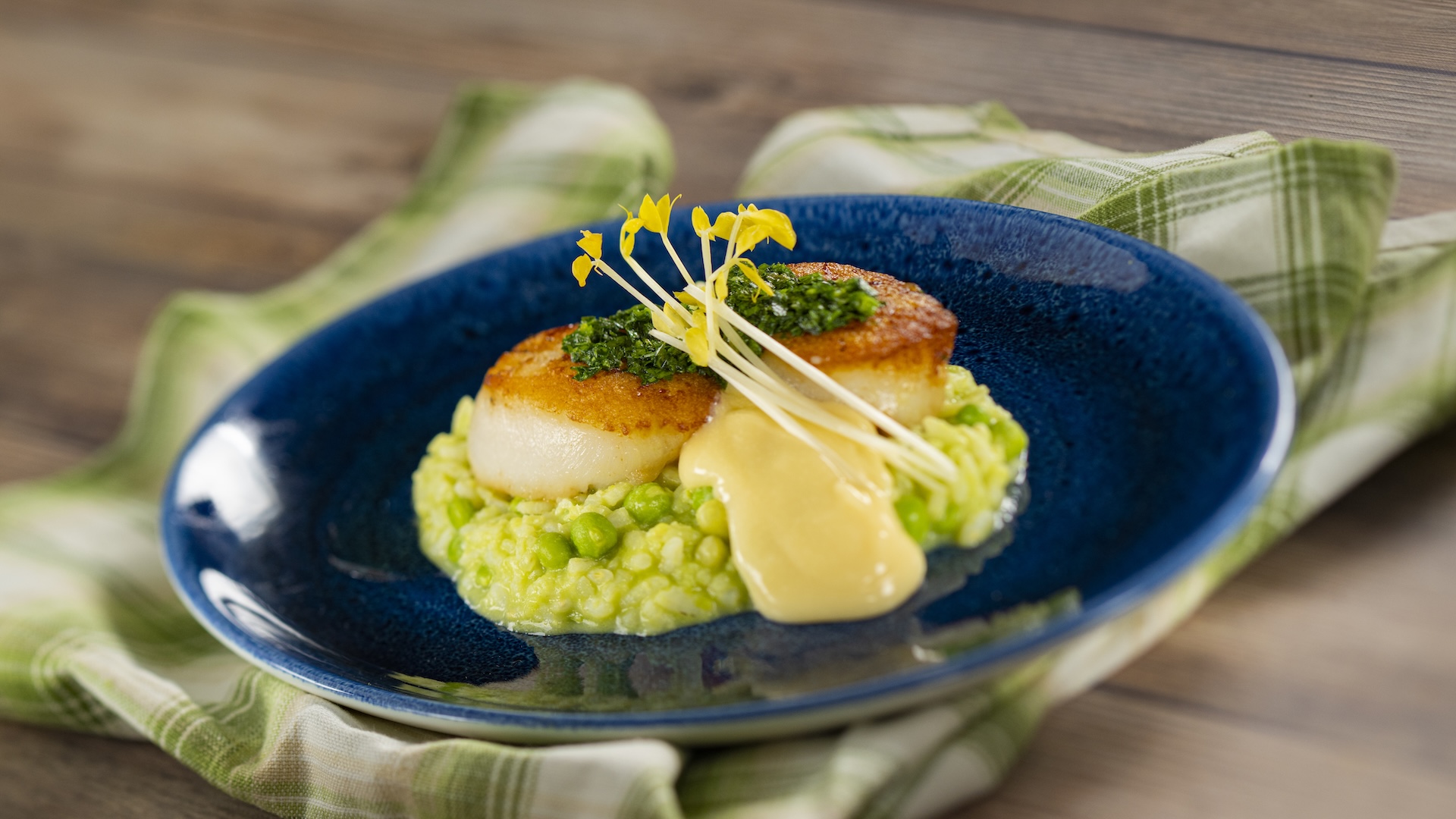 Scallop with spring pea risotto, lemon-beurre blanc, and gremolata