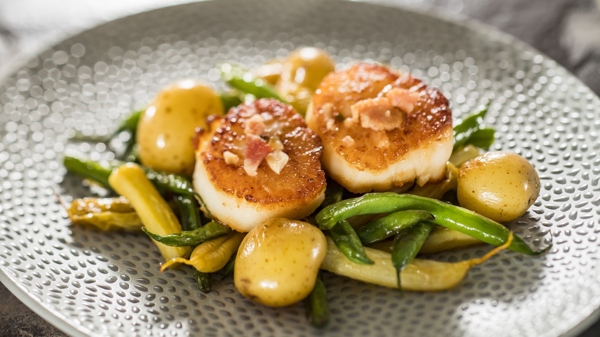 Seared Scallops with french green beans, marble potatoes, and bacon vinaigrette