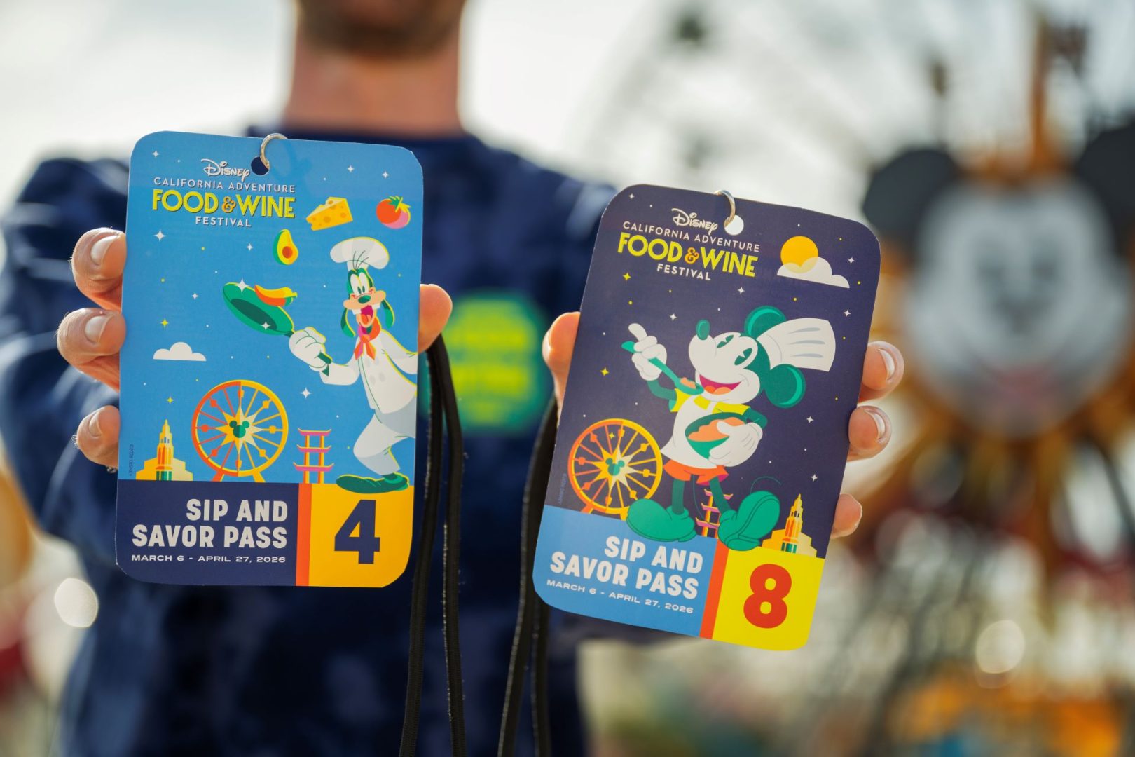 Two colorful Sip and Savor Passes for Disney's Food and Wine Festival.