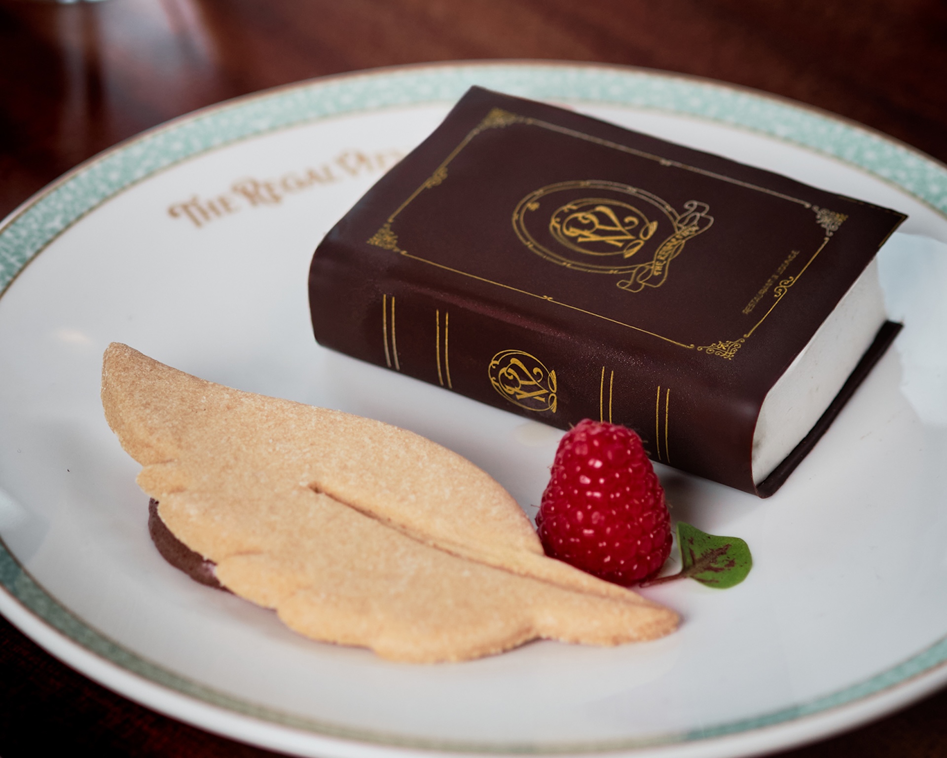 Vanilla Ganache Mousse Cake with raspberry insert and crispy praline  