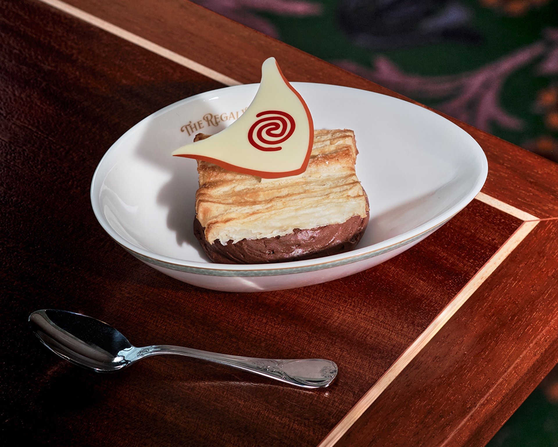 Coconut Mousse Cake with white chocolate, pineapple-passion fruit, and almond 